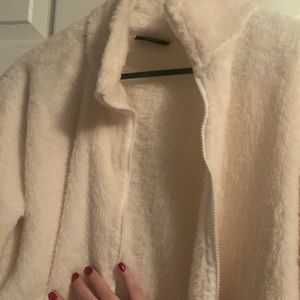 Fuzzy white cream jacket. From Real Essentials size large.